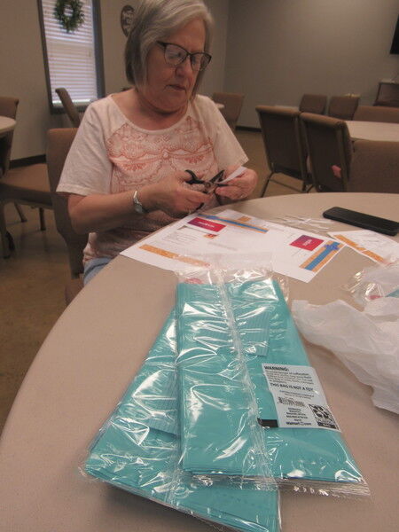 Churches fill bags to honor Muskogee's teachers